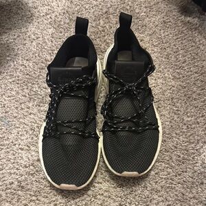 Adidas black tennis shoe